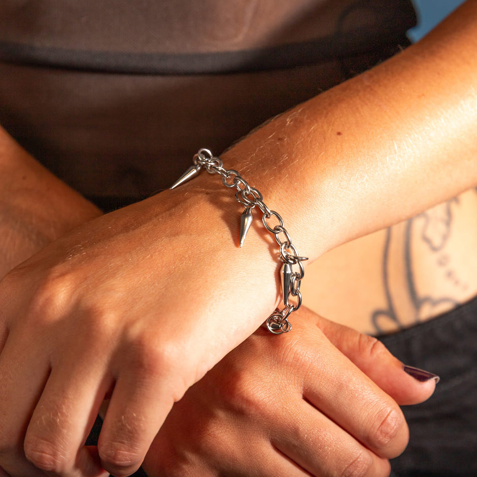 Pulseira Puncture Bind- Contradição Afiada